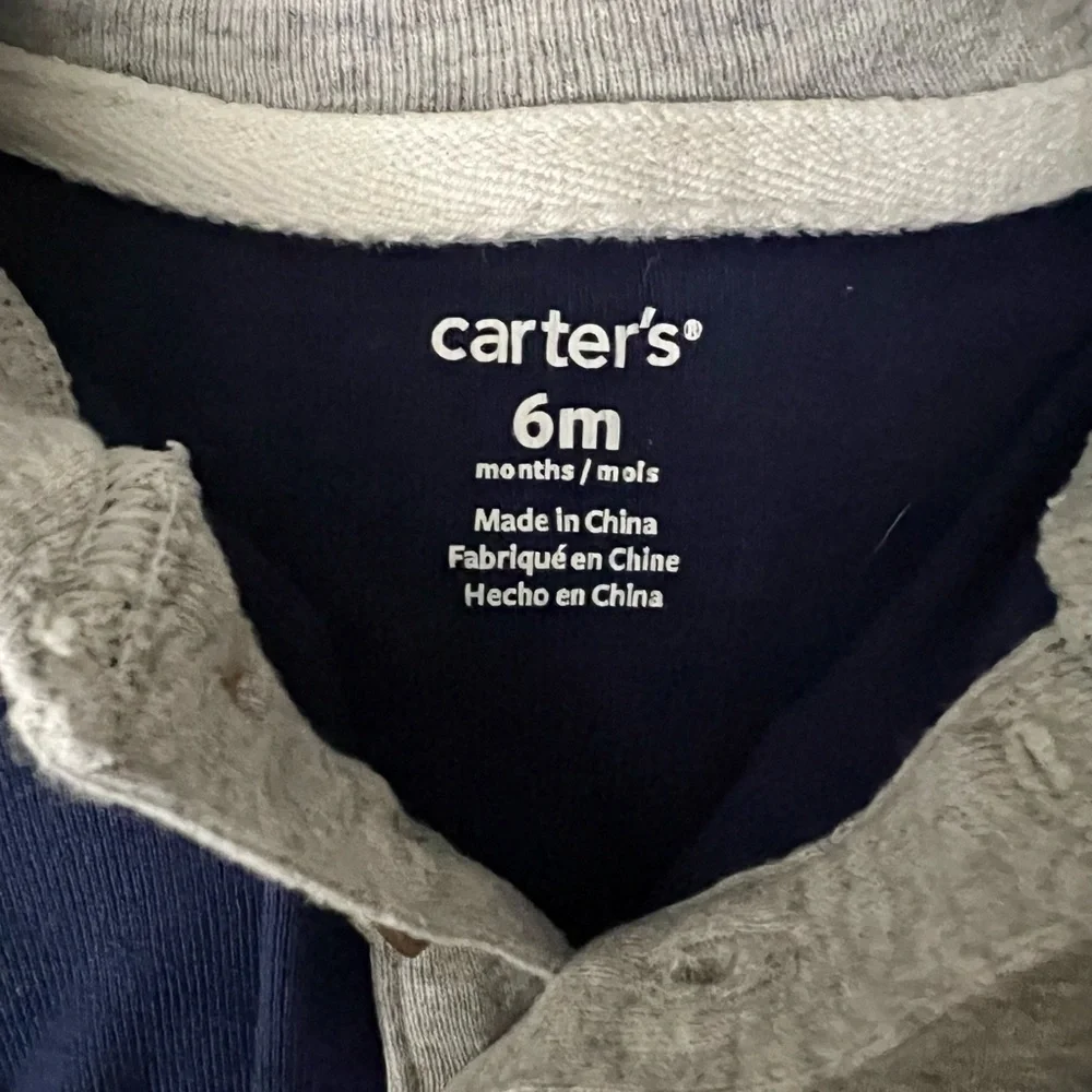 Baby onesies. Both 6m one long sleeve and one short sleeve. Carter’s brand